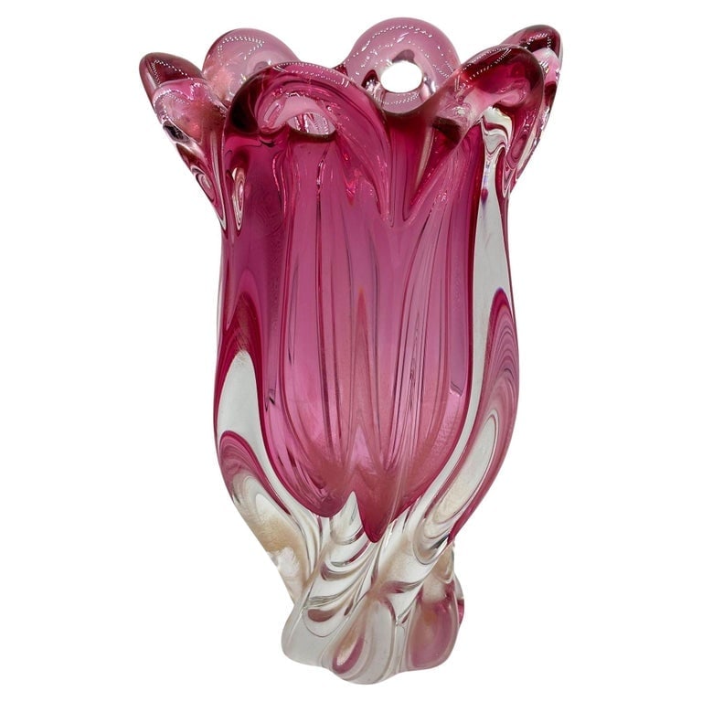 MCM Czech Cranberry Art Glass Vase by Josef Hospodka for Chribska Glassworks: Mid-century Czech cranberry art glass vase by Josef Hospodka for Chbsk glassworks. The vase features a Beautiful pink encased in clear glass, with a twisted form and open reliefs along the top. The pa