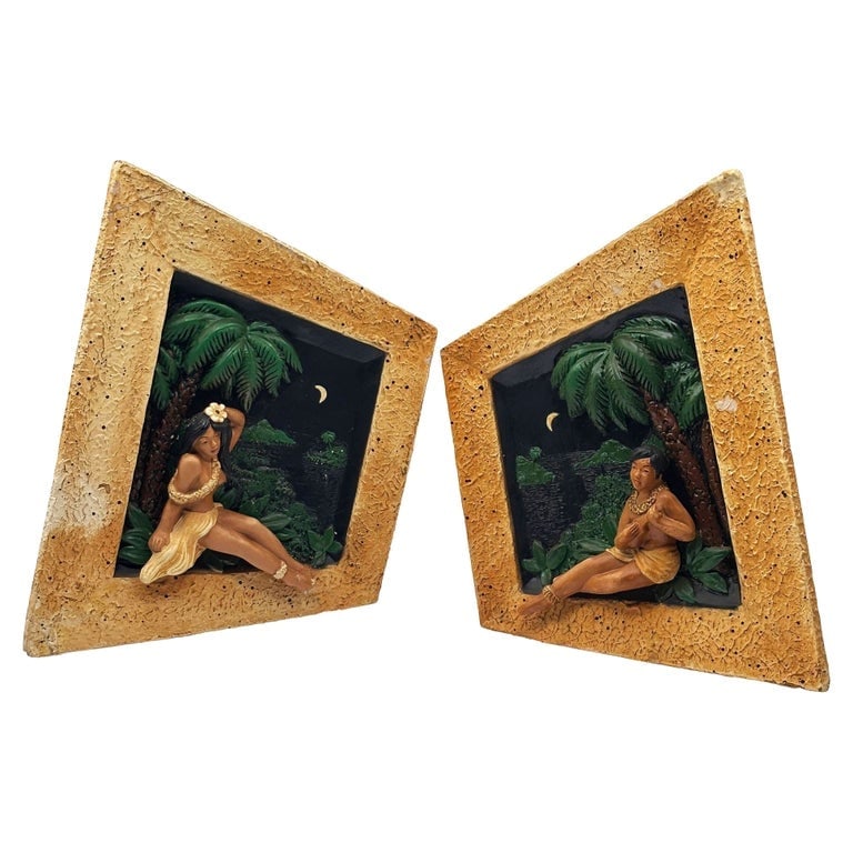 Rare MCM Tropical Hula Girl and Ukulele Boy Art Pottery 3D Wall Sculptural, Pair: Set of two Mid-century Starry Night 3d art pottery wall sculptures featuring a Hula Girl and Ukulele Boy matching set. Each culture features a figural sculpture of a young figure in a night-filled