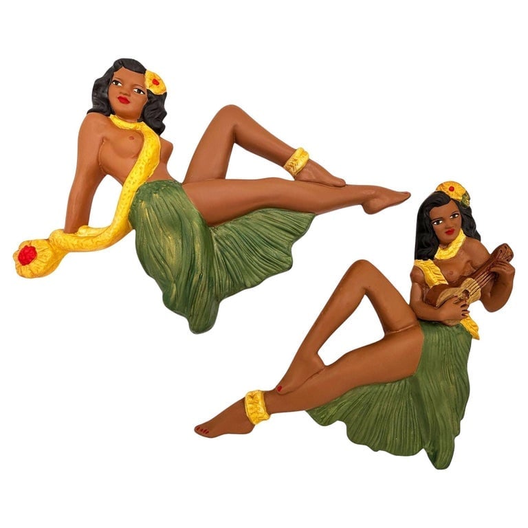 Hawaiian Art Pottery Figure Pin-up Yellow Hula Girl Wall Sculpture, Pair: Original pair of Hawaiian Art Pottery Figure Hawaiian Hula girl wall sculptures by Fond Memories in Kailua-Kona, Hawaii. Each sculpture features a beautiful girl sitting with a raised leg, a grass