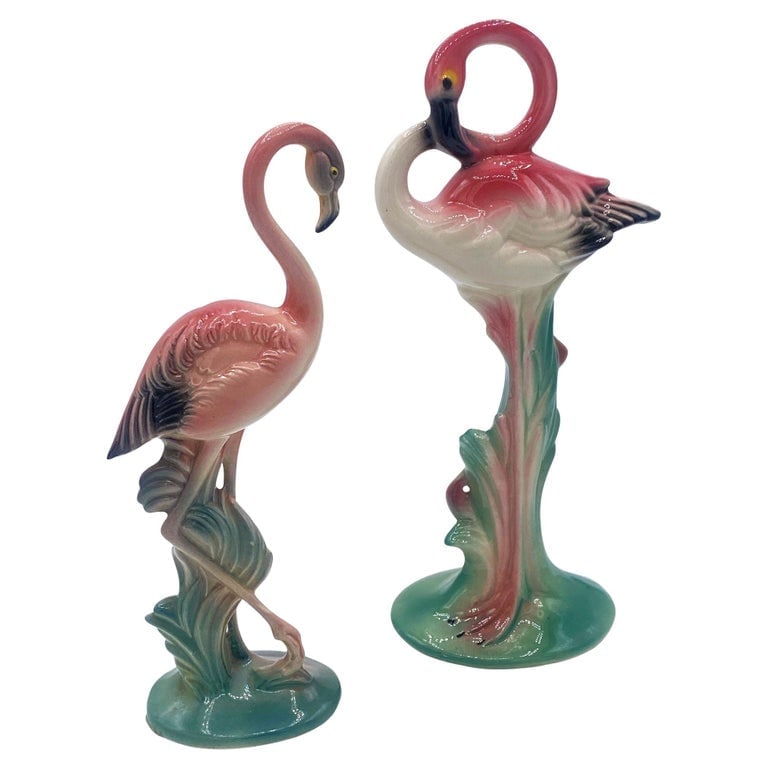 Matching Mid-century Pink Flamingo Ceramic Tabletop Statue Set By Brad Kealer: Mid-century pink and green matching California ceramic flamingo tabletop statues with the short statue by Brad Keeler. The set features two beautifully detailed pink flamingos in lush green leaves