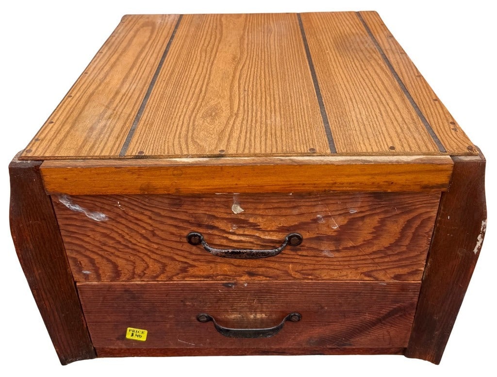 Vintage Two-Drawer Wood Side Table: This vintage two-drawer wood side table features a rustic design with a light wood top and darker stained sides and drawer fronts. The top appears to be constructed from solid wood with paneling laid 