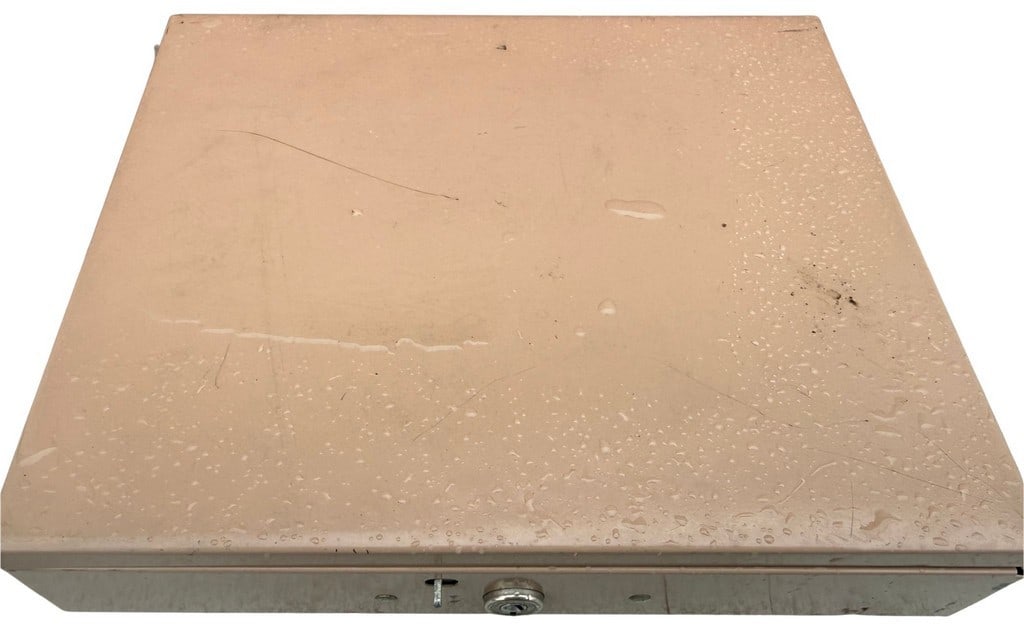 Vintage Metal Cash Box with Removable Tray: This is a vintage cash box, likely from the mid-20th century, constructed from sturdy beige-painted metal. The box features a hinged lid and a locking mechanism at the front (key not present).