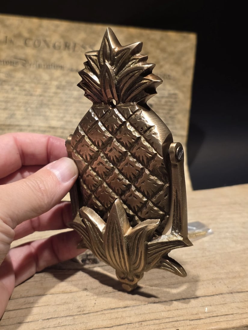 Solid Brass Pineapple Door Knocker Colonial Welcome Sign: 6" x 3" Add a touch of classic charm and "hospitality" to your entryway with this heavy Solid Brass Pineapple Door Knocker. In the American Colonial tradition, the pineapple is the universal symbol