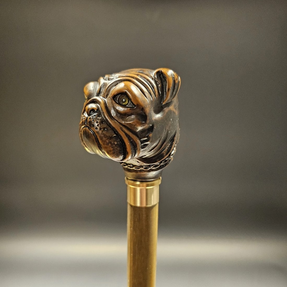 36" Bulldog Dog Head Walking Stick Cane: 36" Long Crafted in Italy, this reproduction walking stick features a bulldog head securely mounted on a natural wood shaft available exclusively in a 36" length. This elegant walking stick serves bot