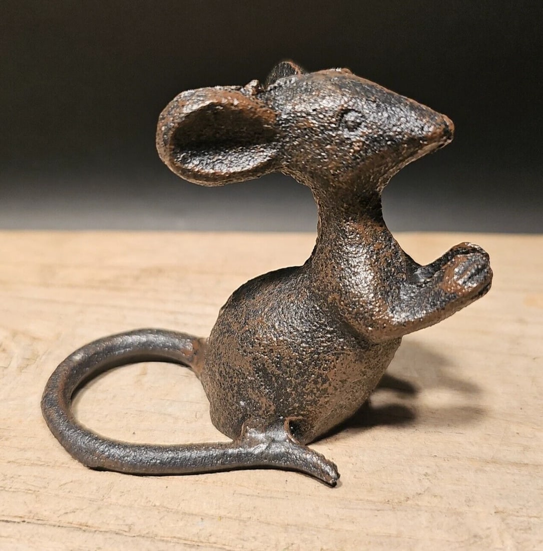Cast Iron Mouse: 3" Tall x 4" Long x 2 1/2" Wide Nice Reproduction solid cast iron mouse statue. This mouse is much thicker, and heavier then other similar ones we have seen. Makes a great accent piece indoor or out. 