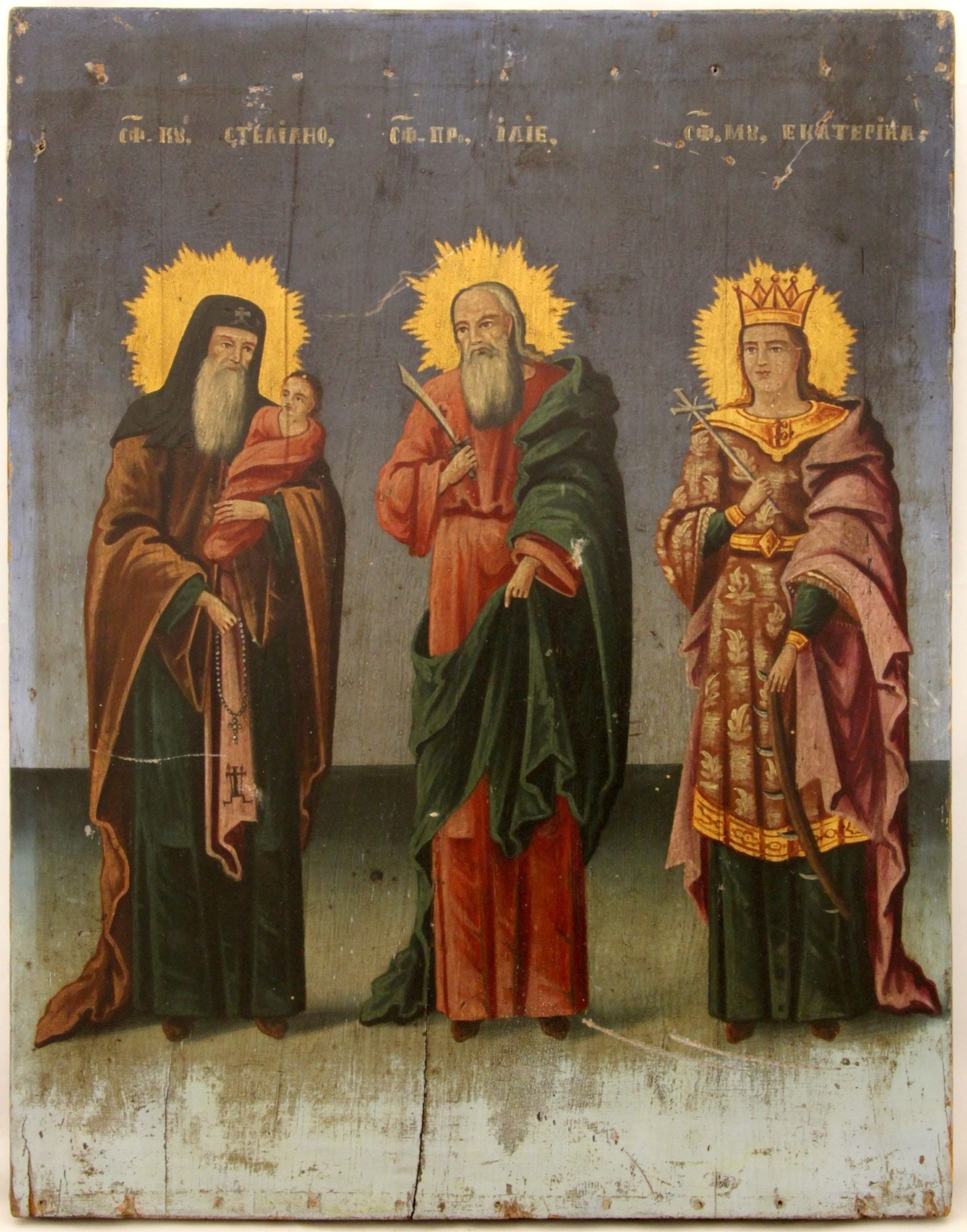 Saints: Description: Saints – Stylianos, Elijah, Catherine. Large russian wooden icon. Details: Dimensions 34 × 43 cm Century 19 Reserve: $800.00 Shipping: Domestic: Flat-rate of $50.00