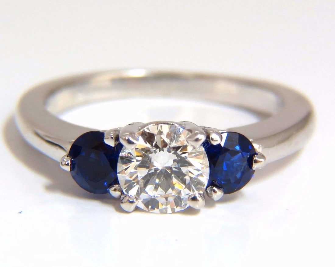 1.57CT NATURAL DIAMONDS SAPPHIRE THREE STONE RING 14KT ROYAL BLUE *v: Title: 1.57CT NATURAL DIAMONDS SAPPHIRE THREE STONE RING 14KT ROYAL BLUE *v Description: Classic Diamond & Sapphires, Three Stone .77ct. Round Cut diamond Full Cut Brilliant G-color Si-1 Clarity