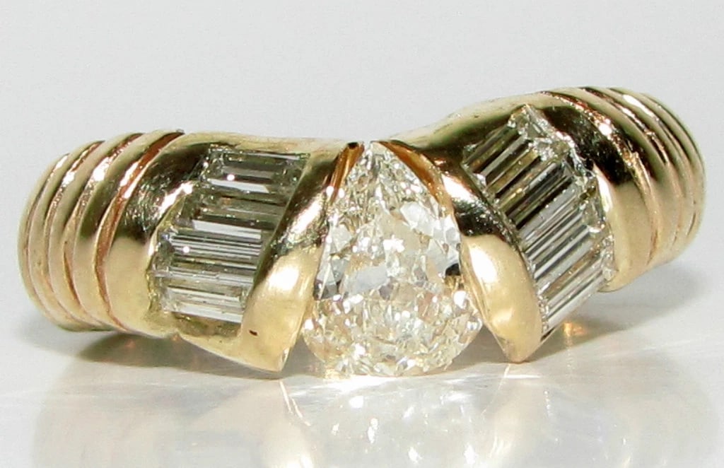 1.20CT PEAR SHAPE DIAMOND BAND RING 14KT+: Title: 1.20CT PEAR SHAPE DIAMOND BAND RING 14KT+ Description: ONLY MAGNIFICENT JEWELS The anti-catch for those whom like smooth finish Durable, wear this anywhere and enjoy class! .50ct. pear shape