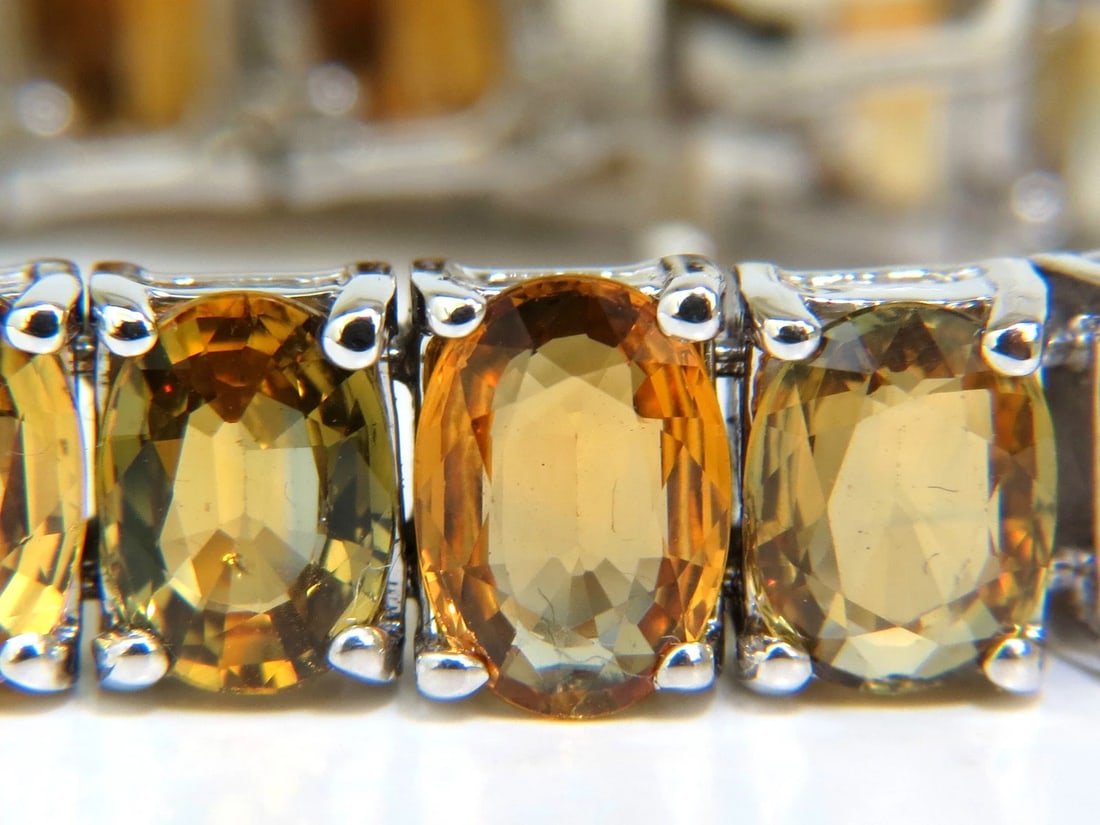 33.00ct. NATURAL GEM YELLOW GREEN ORANGE COLOR SAPPHIRES TENNIS BRACELET 14kt *v: Title: 33.00ct. NATURAL GEM YELLOW GREEN ORANGE COLOR SAPPHIRES TENNIS BRACELET 14kt *v Description: 33.00CT Natural Sapphires tennis bracelet. Rare "Honey Colors" Orange, brown, and greens Sapphires 