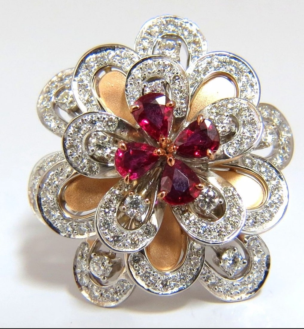 2.36Ct Natural Ruby Diamonds 4 Tier 3D Cocktail Petal Diamond Ring 18kt**: Title: 2.36Ct Natural Ruby Diamonds 4 Tier 3D Cocktail Petal Diamond Ring 18kt** Description: 3D Petal Leaf 4 tier cocktail ring 1.06ct round diamonds G-color vs-2 clarity 1.30ct natural pear shaped r