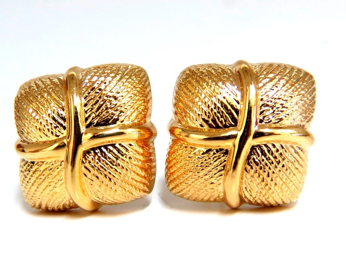 14kt Gold Textured Clip Earrings & Omega**: Title: 14kt Gold Textured Clip Earrings & Omega** Description: Textured Clip Earrings Measurements of Earrings: Measurements: .86 x .85 Inch Depth: .23inch Comfortable Omega Clips 10.7 grams / 14kt. Y