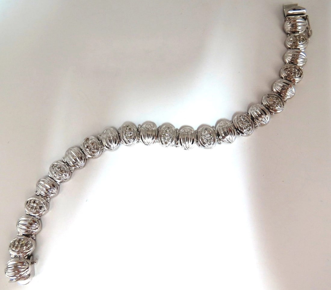 Mod Watermelon Link 1.00ct Diamonds Tennis Bracelet 14kt *v: Title: Mod Watermelon Link 1.00ct Diamonds Tennis Bracelet 14kt *v Description: Watermelon Oval form diamonds tennis bracelet. 1.00ct. natural diamonds. Rounds, Full cut brilliants H colors Si-1