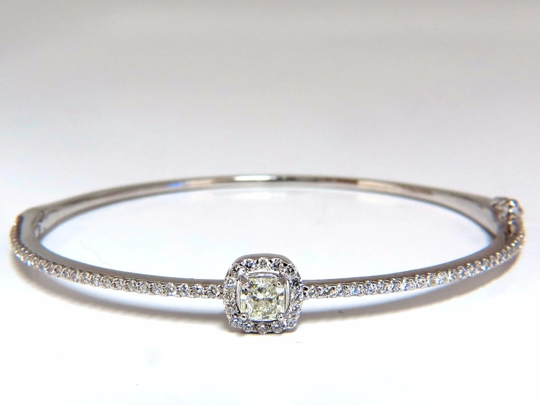 .95ct natural round diamond cluster halo bangle bracelet 14kt *v: Title: .95ct natural round diamond cluster halo bangle bracelet 14kt *v Description: Cushion Halo Bangle .45ct. Natural Cushion Cut diamond. I-color vs-2 clarity. .50ct Side round natural diamonds:
