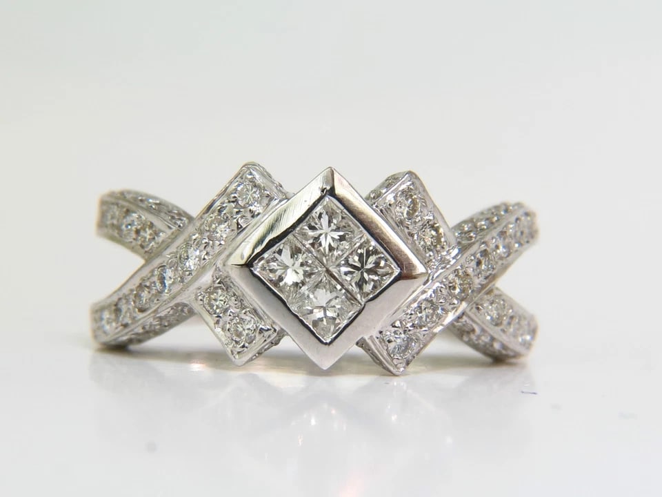 1.00CT NATURAL PRINCESS CLUSTER & ROUNDS CROSSOVER RING SPLIT SHANK 18KT*v: Title: 1.00CT NATURAL PRINCESS CLUSTER & ROUNDS CROSSOVER RING SPLIT SHANK 18KT*v Description: ONLY MAGNIFICENT JEWELS . 1.00ct. Natural diamonds cross over ring. Princess cuts & rounds, Brilliant &