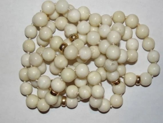Angelskin Coral Flapper Necklace Opera Style 1940s With 14 Kt Gold Beads: Title:Angelskin Coral Flapper Necklace Opera Style 1940s with 14 kt Gold Beads Description:Beautiful 1950's vintage Mediterranean angel-skin coral necklace with 14 kt gold beads. This necklace measure