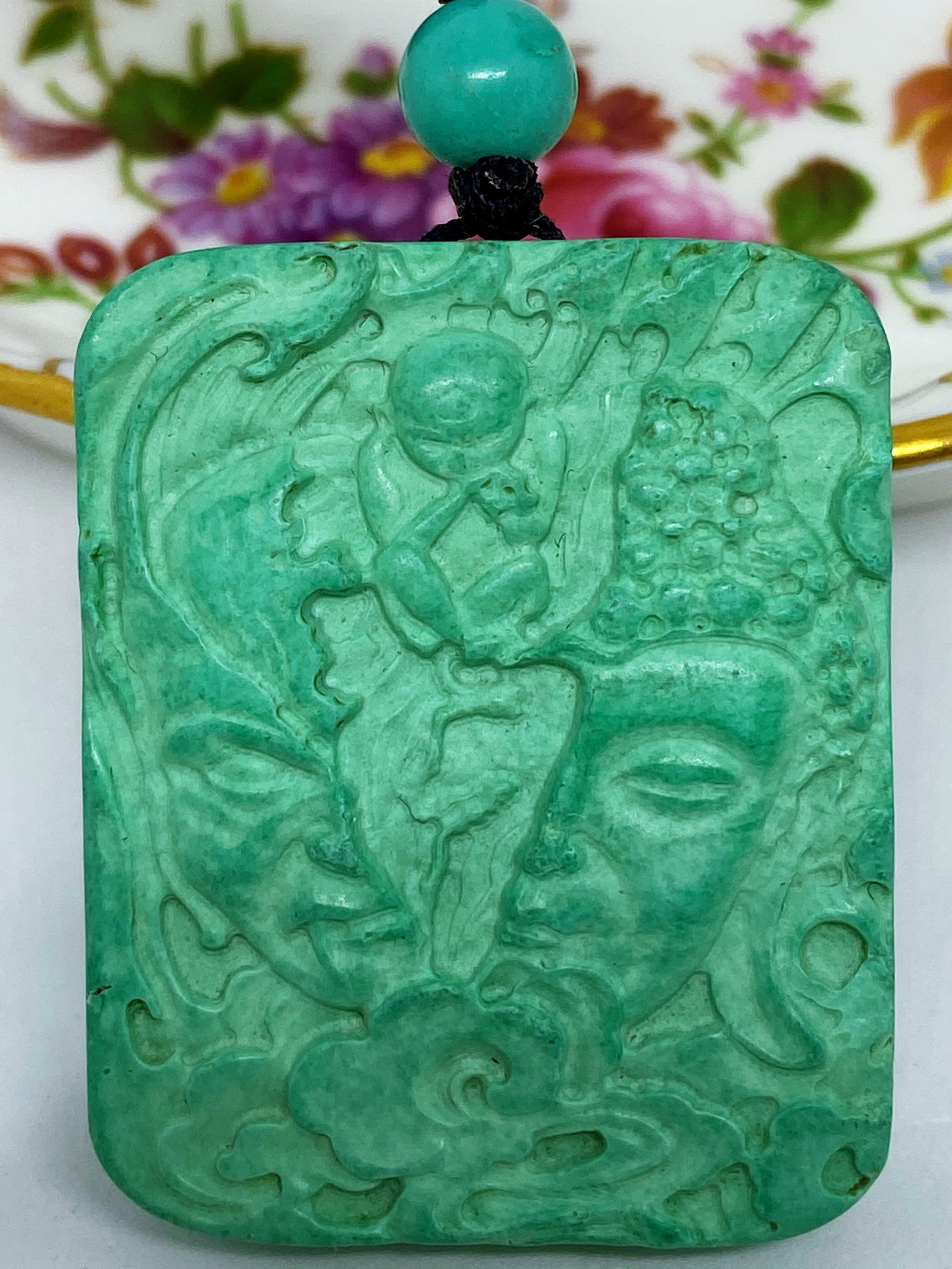 Chinese Hand Carved Turquoise Buddha-Evil Head Amulet Figure: Title: Chinese Hand Carved Turquoise Buddha-Evil Head Amulet Figure Description:Chinese Hand Carved Turquoise Buddha-Evil Head Amulet Figure This gorgeous piece of Greenish blue Turquoise Stone Hand C