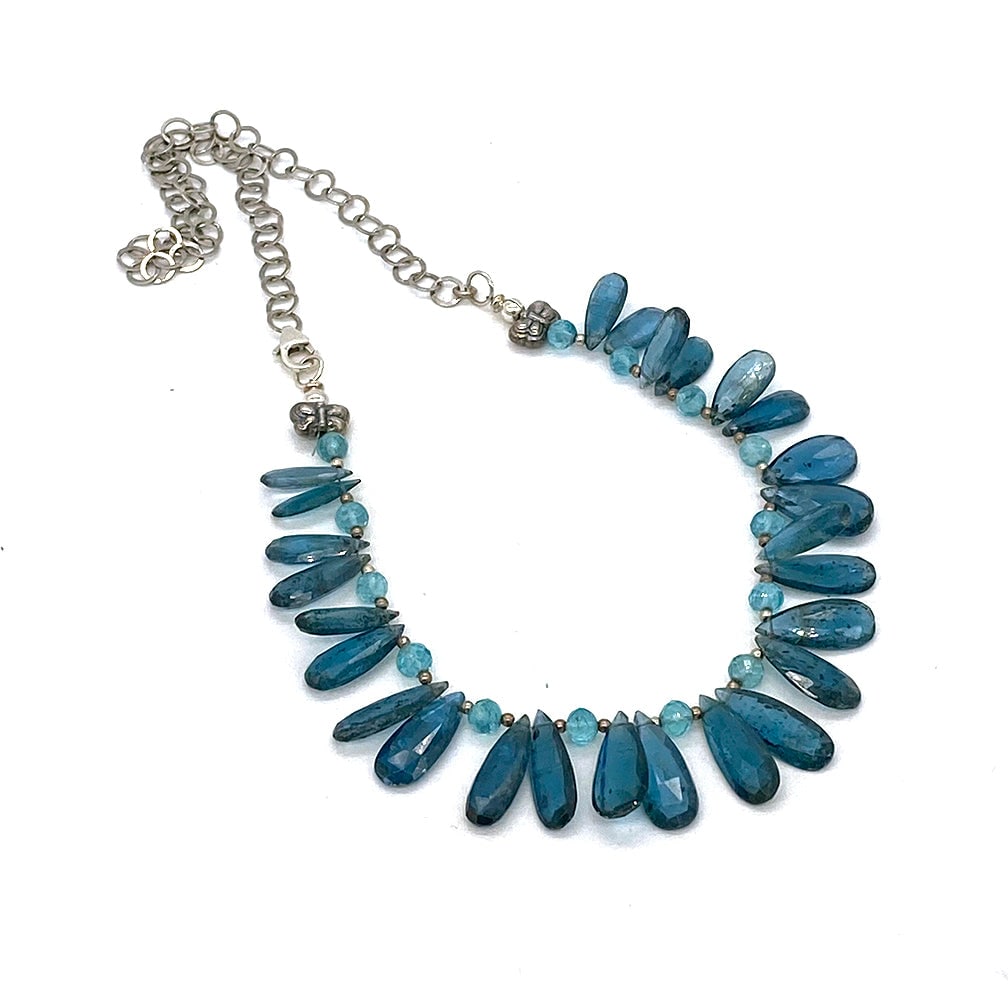 Kyanite And Sterling Necklace: This is a translucent kyanite with sterling chain bib necklace. We created this deep sea blue necklace with very rare up to 19 x 8 mm faceted pear cut translucent kyanite, 5 mm faceted aquamarine
