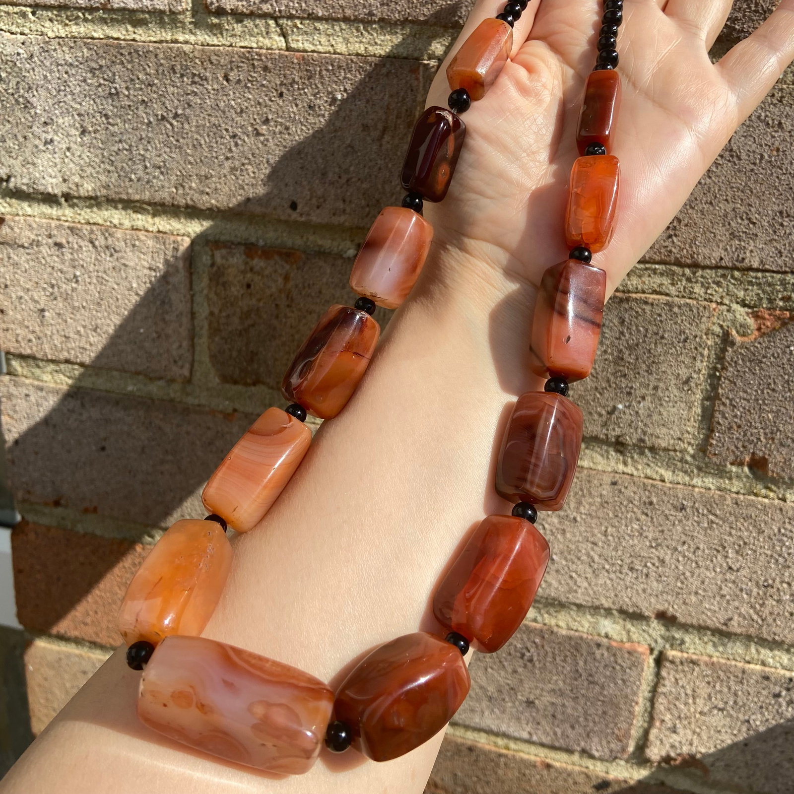 Large Vintage Carnaline Magnificent Beads Necklace: Title: Large Vintage Carnaline Magnificent Beads Necklace Description:This stunning vintage necklace showcases magnificent carnelian beads, each exuding a rich, warm hue and a smooth, polished