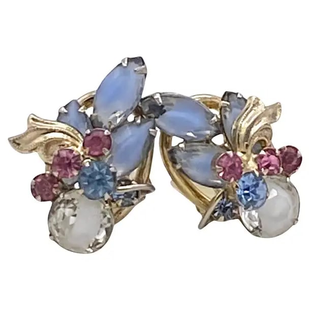 Juliana Dande Givre Stones Clip-On Earrings: This is a pair of 1960s Juliana DandE givre stones clip-on earrings. They are light blue navette givre and large round ice givre stones (see 2nd photo) set on Gold -tone metal rings and with metal lea