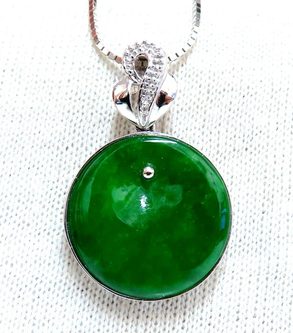 GIA Certified Natural Green Jade Necklace 18Kt**: Title: GIA Certified Natural Green Jade Necklace 18Kt** Description: GIA Certified: Carved Natural Jade necklace. 18kt. white gold. Item: 7.6gms $2200 GIA Certified Natural Circular Jade Pendant Repor