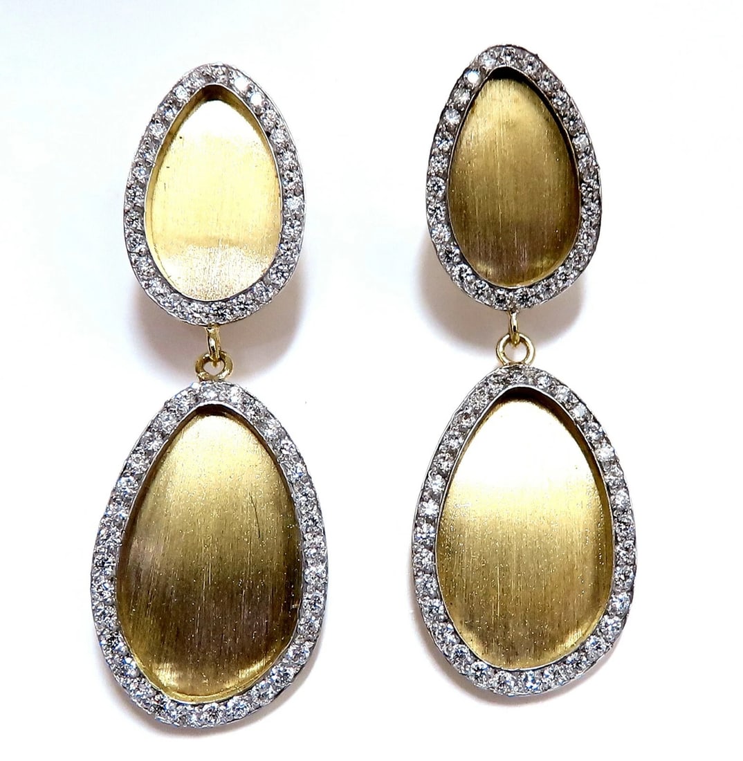 1.30ct Natural Diamonds Tear Drop Form Brush Finish Clip Earrings 14 Karat**: Title: 1.30ct Natural Diamonds Tear Drop Form Brush Finish Clip Earrings 14 Karat** Description: MAGNIFICENT JEWELS Brush Finished Tear Drop Dangle Earrings 1.30ct. Natural diamonds Rounds, full