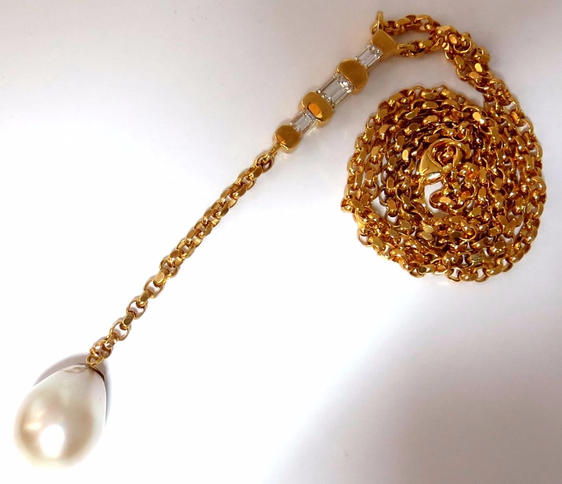 15.5mm natural south sea pearl 1.01ct emerald cut diamonds necklace drop bolo**: Title: 15.5mm natural south sea pearl 1.01ct emerald cut diamonds necklace drop bolo** Description: Bolo Form Dangle Drop The Natural South Sea Cream Color Pearl Necklace. 15.5 X 12.7mm White & slight