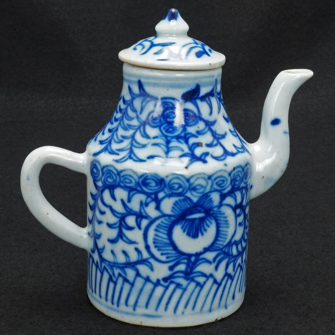 Chinese Kitchen Qing Oil or Soy Pot: Title:Chinese Kitchen Qing Oil or Soy Pot Size:5 7/8 in (14.9 cm) tall x 5 ¼ in (13.3 cm) long x 3 in (7.6 cm) wide. Description:A hand potted and painted small porcelain Chinese ewer with coba