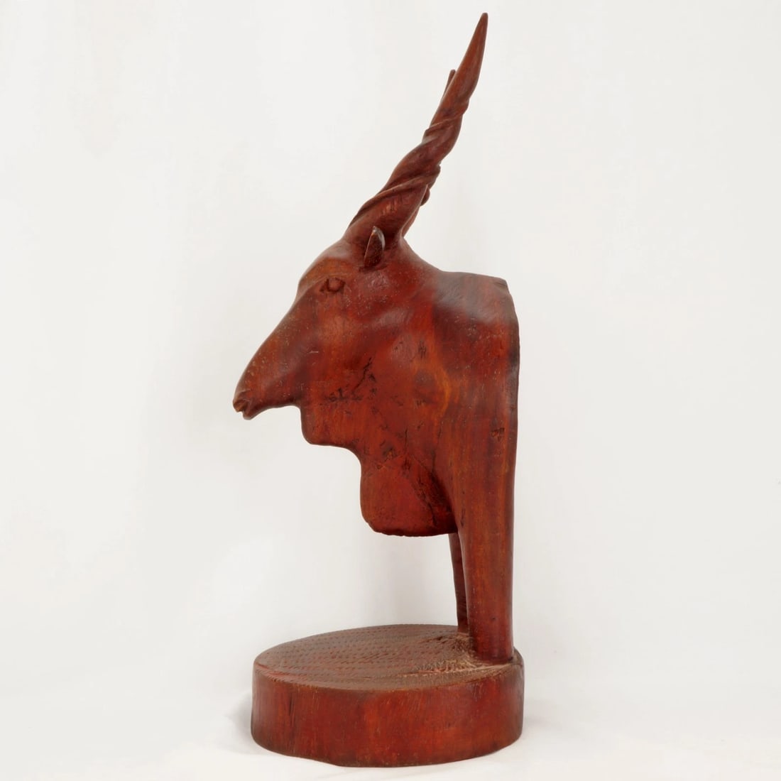 Single Large African Antelope Wood Bookend: Title:Single Large African Antelope Wood Bookend Size:14 ¼ in (36.2 cm) tall x 5 ½ in (14.0 cm) deep x 5 ¾ in (14.6 cm) wide. Description:A large and heavy hand-crafted carving of