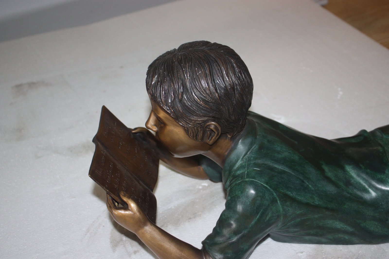 Boy Laying Reading Book Bronze Statue - 11"H. - 2