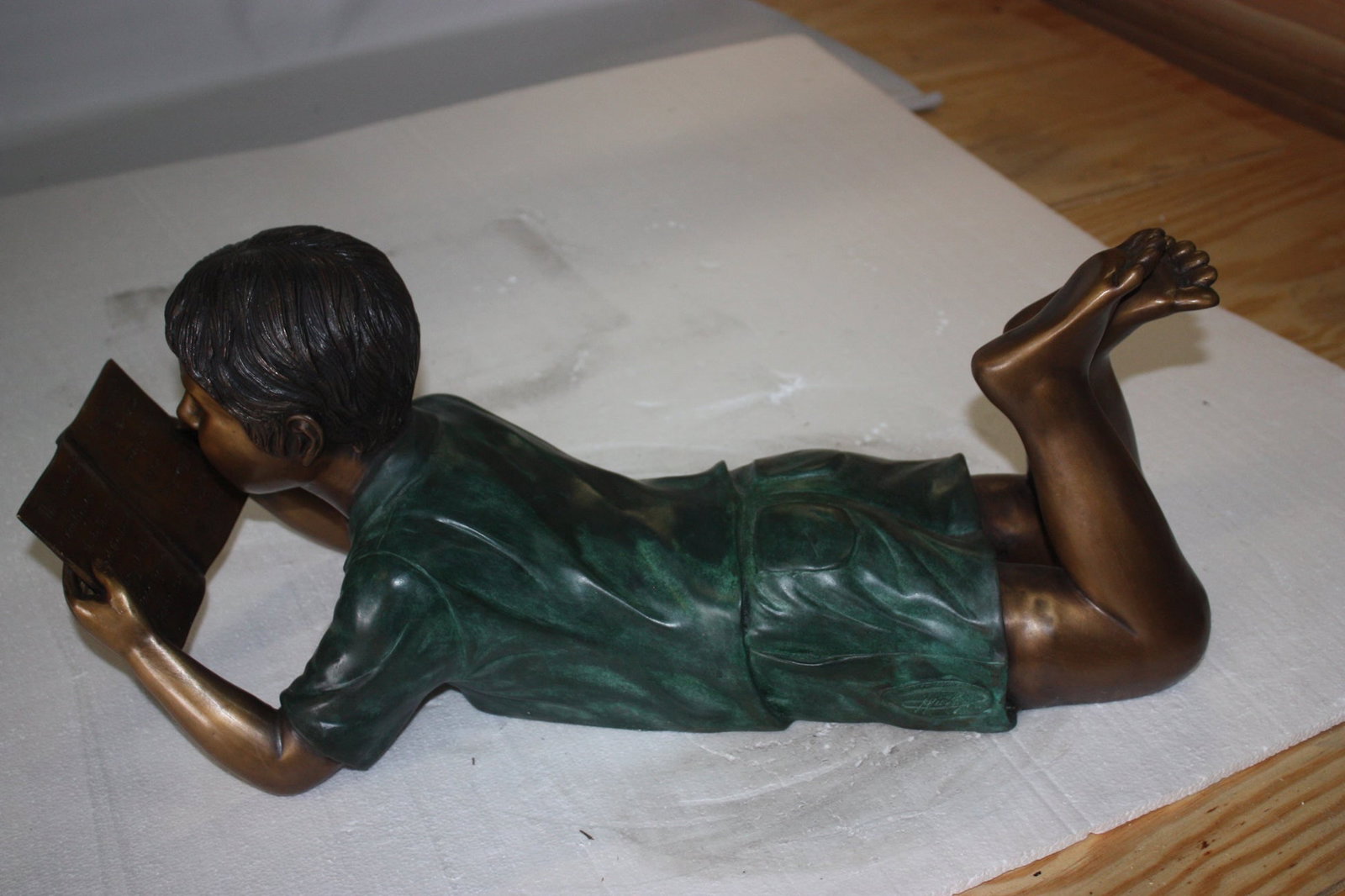 Boy Laying Reading Book Bronze Statue - 11"H. - 7