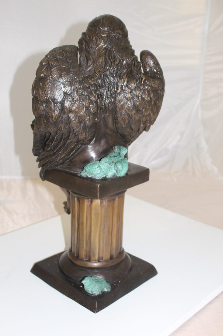 Angel sitting on Column Bronze Statue - Size: 10"L x 9"W x 22"H. - 10