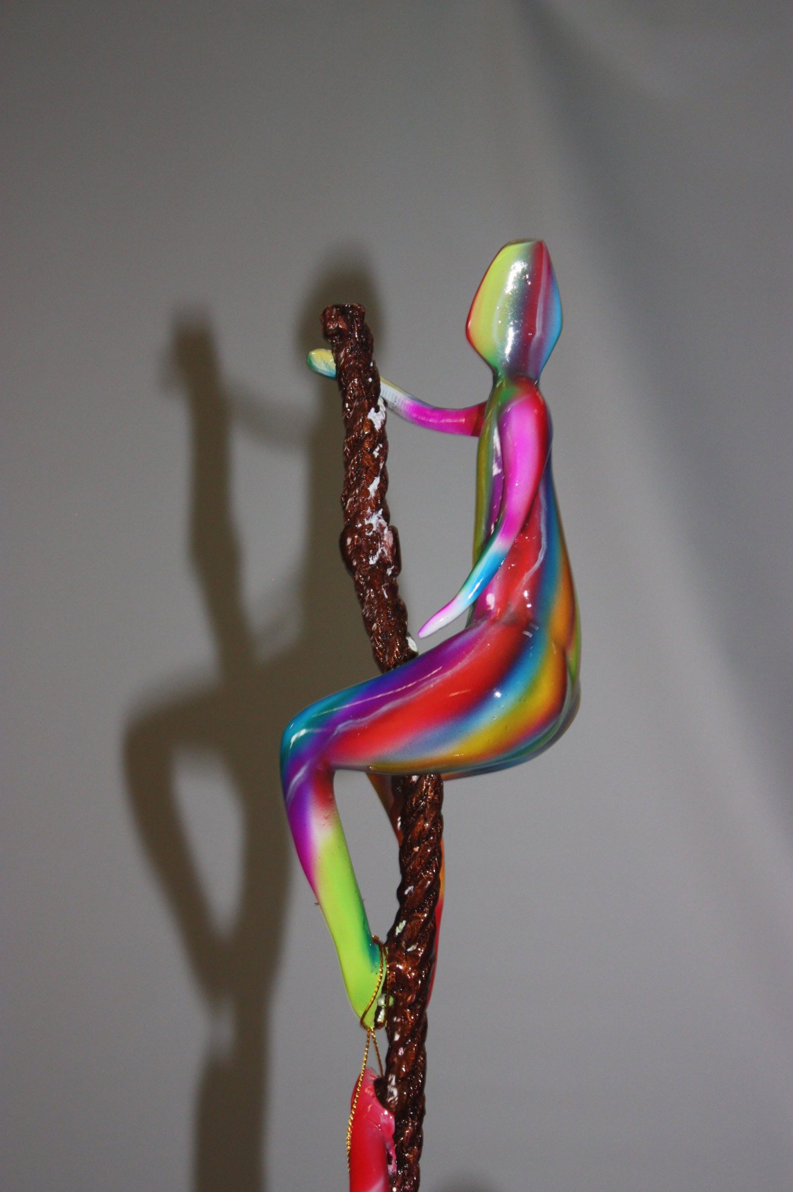 Three Man Made of Bronze Climbing on Rope - 6