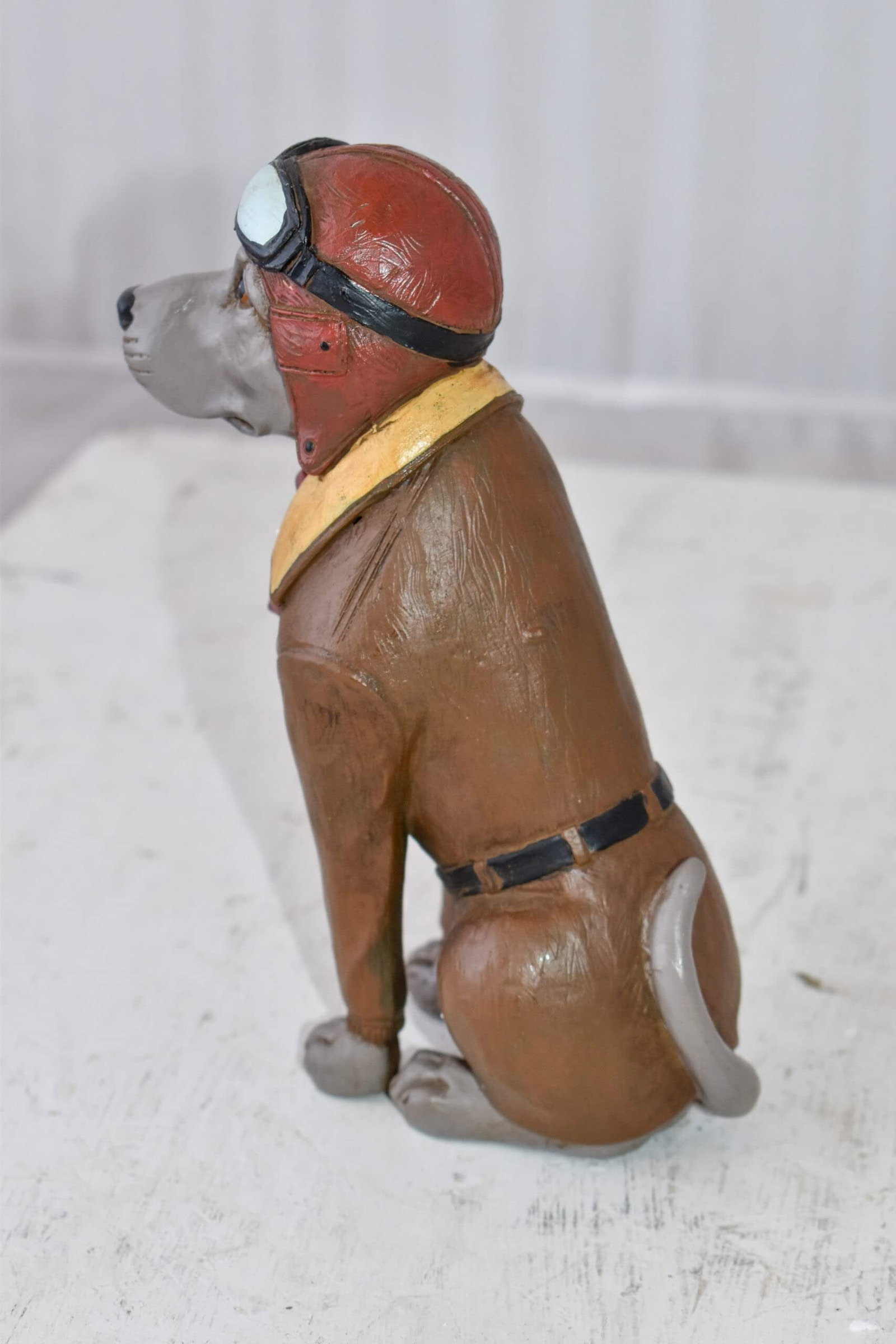 A Happy Dog Dressed Like a Pilot Resin Statue Size: 3" x 4" x 8"H - 10
