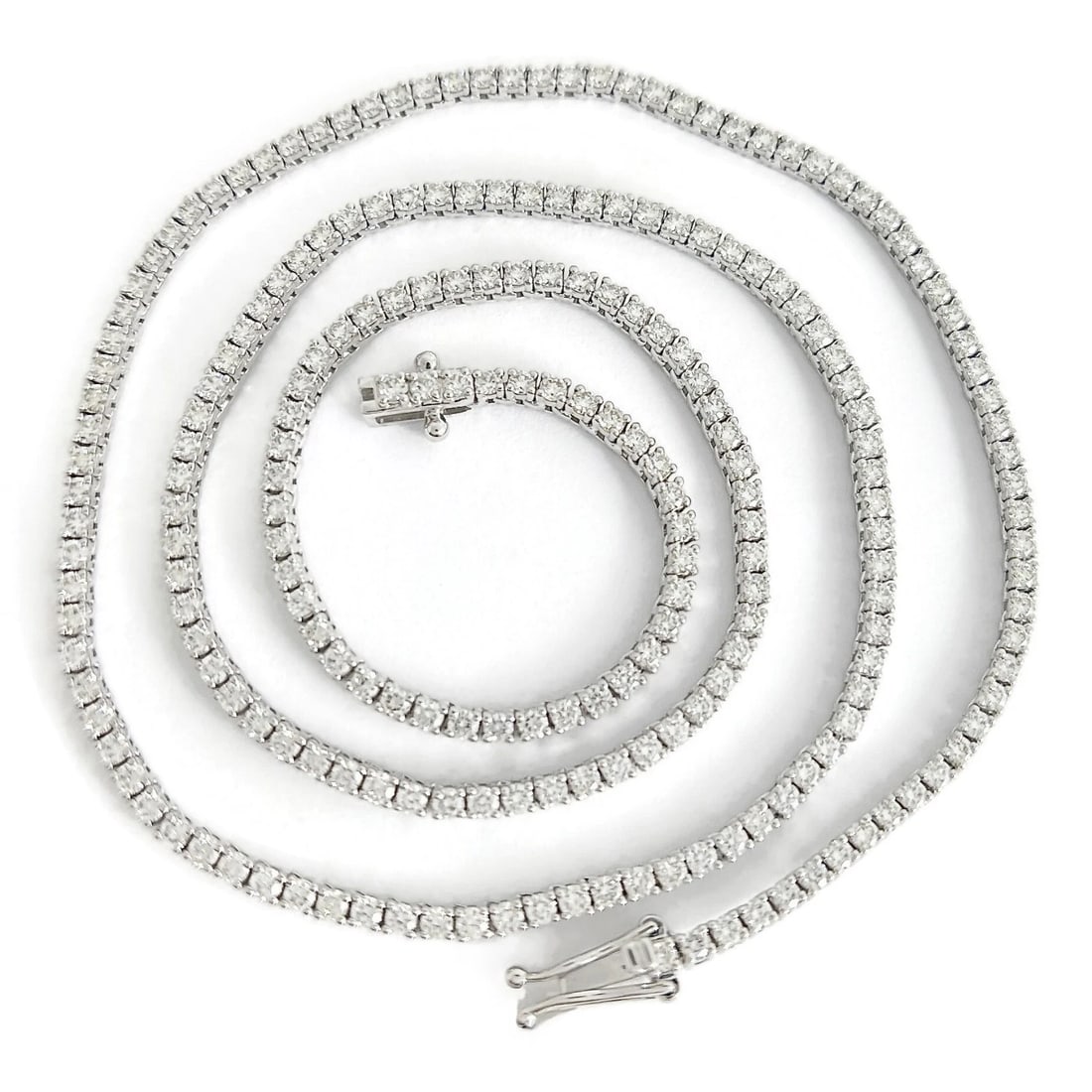 Round Diamond Tennis Necklace 14K White Gold, 18 Inches, 5.01 CTW: Round Diamond Tennis Necklace 14K White Gold, 18 Inches, 5.01 CTW This is a gorgeous necklace! Please let us know if you have any questions. Diamonds: 226 round brilliant cuts 5.01 ctw; G-H, VS2-SI1 M