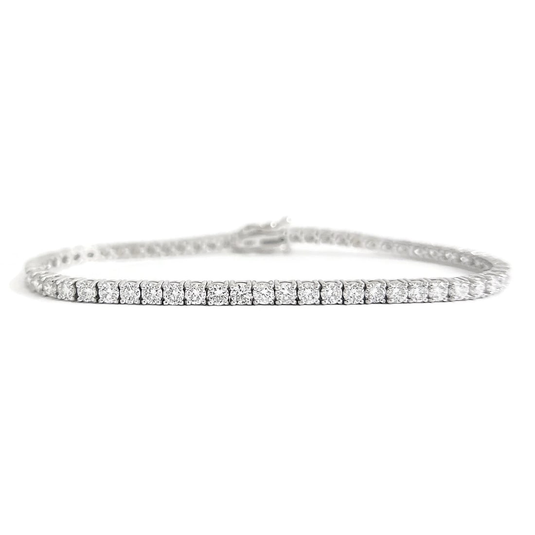 Round Lab-Created Diamond Tennis Bracelet 14K White Gold, 7 Inches, 5.06 CTW: Round Lab-Created Diamond Tennis Bracelet 14K White Gold, 7 Inches, 5.06 CTW This is a gorgeous and classic tennis bracelet! Please let us know if you have any questions :) Diamonds: 61 lab-created