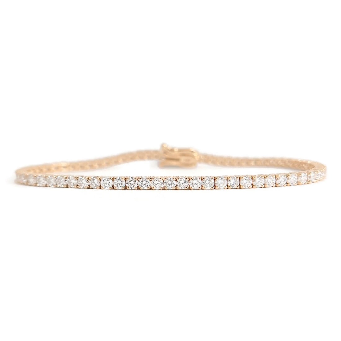 Round Diamond Tennis Bracelet 14K Pink Rose Gold, 7 Inches, 4.24 CTW: Round Diamond Tennis Bracelet 14K Pink Rose Gold, 7 Inches, 4.24 CTW This is a gorgeous bracelet! Please let us know if you have any questions :) Diamonds: 64 round brilliant cuts, 4.24 ctw, I-J, SI1-