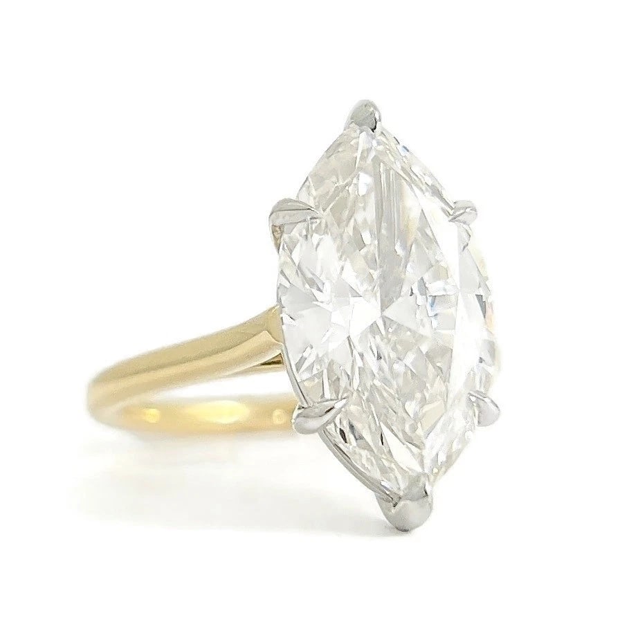 GIA Marquise Diamond Solitaire Engagement Ring 18K Yellow Gold Platinum, 4.22 CT: GIA Marquise Diamond Solitaire Engagement Ring 18K Yellow Gold Platinum, 4.22 CT This is a gorgeous diamond engagement ring! Please let us know if you have any questions! Diamonds: 1 marquise 4.22 ct,