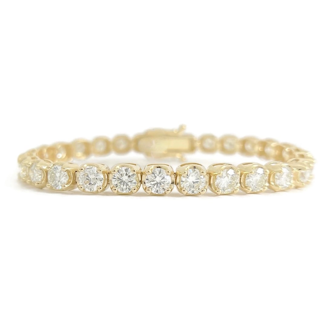 Round Diamond Buttercup Tennis Bracelet 14K Yellow Gold, 7 Inches, 11.04 CTW: Round Diamond Buttercup Tennis Bracelet 14K Yellow Gold, 7 Inches, 11.04 CTW This is a unique yet classic tennis bracelet! Please let us know if you have any questions :) Diamonds: 28 round brilliant 