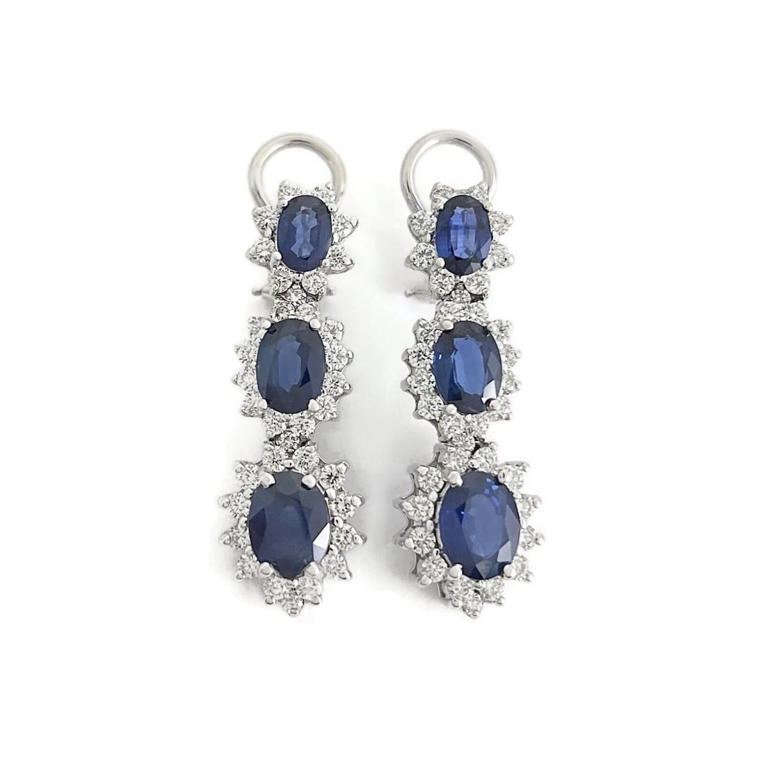 Oval Blue Sapphire Diamond Halo Dangle Drop Earrings 18K White Gold, 9.10 CTW: Oval Blue Sapphire Diamond Halo Dangle Drop Earrings 18K White Gold, 9.10 CTW These are beautiful earrings! Please let us know if you have any questions. Gemstones: 6 oval blue Ceylon sapphires 7.05 c