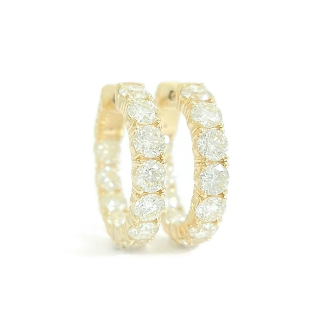 Inside-Out Diamond Hoop Earrings 14K Yellow Gold, 5.39 CTW: Inside-Out Diamond Hoop Earrings 14K Yellow Gold, 5.39 CTW These are beautiful earrings! Please let us know if you have any questions. Diamonds: 22 round brilliant cuts 5.39 ctw, H-I, SI1-SI2 Metal: 1
