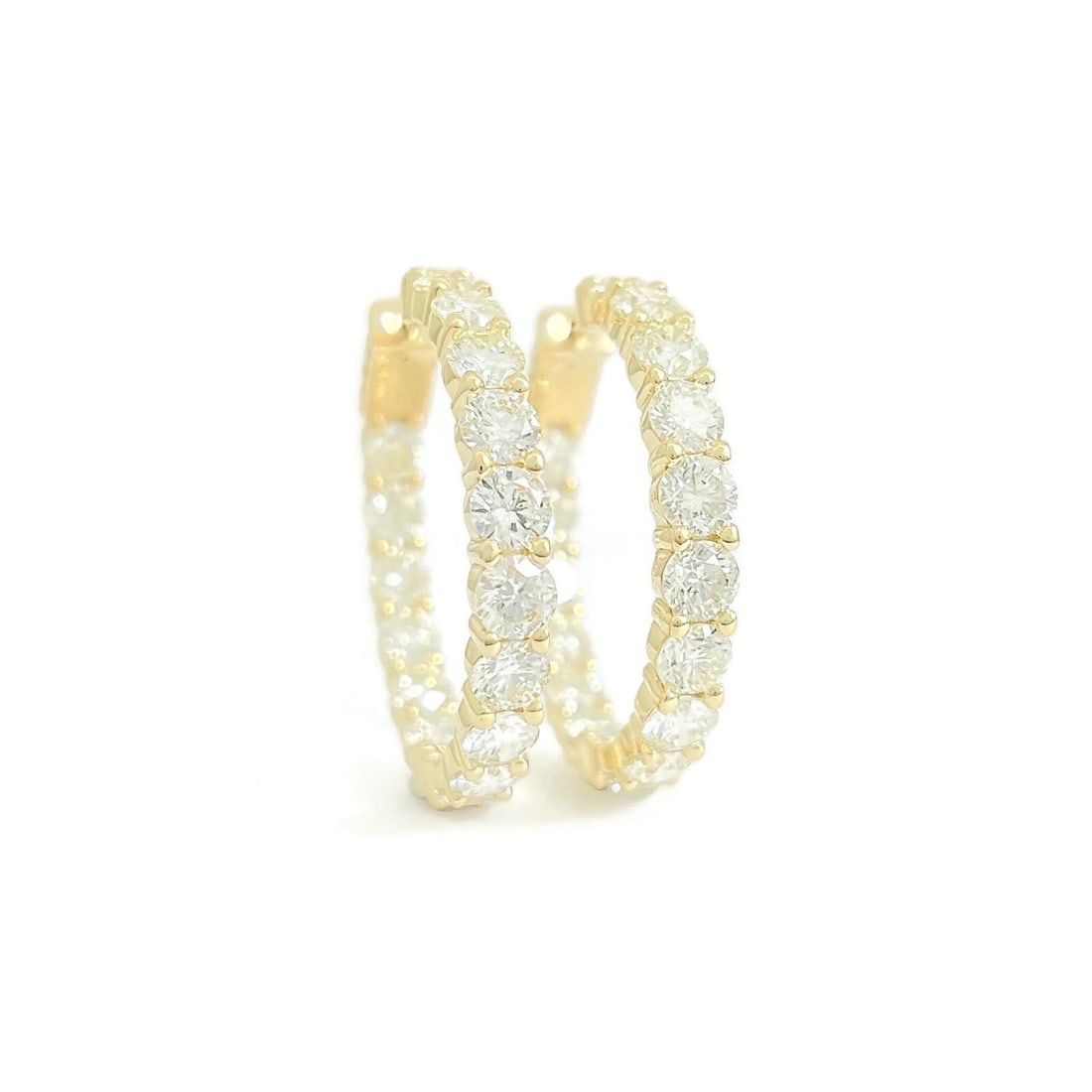 Inside-Out Diamond Hoop Earrings 14K Yellow Gold 9.45 CTW: Inside-Out Diamond Hoop Earrings 14K Yellow Gold 9.45 CTW These are lovely earrings! Please let us know if you have any questions. Diamonds: 32 round brilliant cuts 9.45 ctw, H-I, SI1-SI2 Metal: 14K y