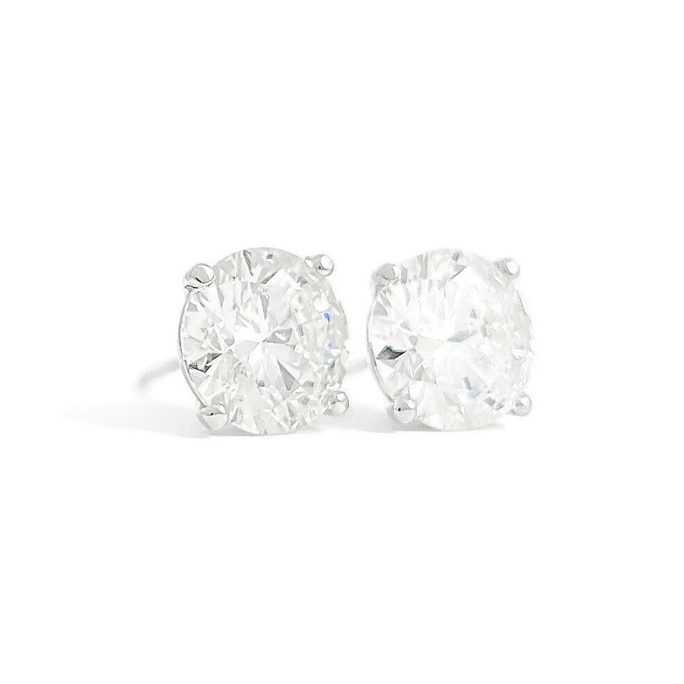 Round Diamond Stud Earrings 14K White Gold 4-Prong Martini, 4.07 CTW: Round Diamond Stud Earrings 14K White Gold 4-Prong Martini, 4.07 CTW These are gorgeous diamond stud earrings! Please let us know if you have any questions. Diamonds: 2 round brilliant cuts 4.07 ctw, 