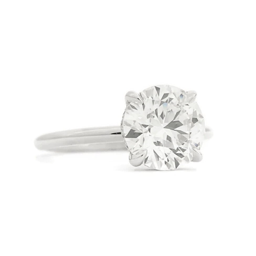 GIA Round Solitaire Diamond Hidden Halo Engagement Ring 14K White Gold, 1.85 CTW: GIA Round Solitaire Diamond Hidden Halo Engagement Ring 14K White Gold, 1.85 CTW This is a gorgeous diamond engagement ring! Please let us know if you have any questions! Diamonds: 1.85 ctw; 1 round b
