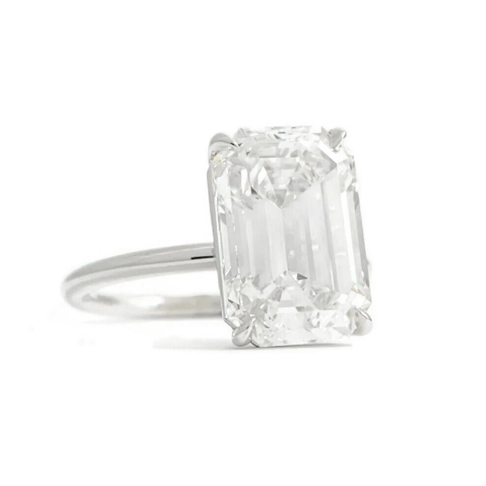 GIA Emerald Cut Solitaire Diamond Engagement Ring 14K White Gold, 4.24 CT: GIA Emerald Cut Solitaire Diamond Engagement Ring 14K White Gold, 4.24 CT This is a gorgeous diamond engagement ring! Please let us know if you have any questions! Diamonds: 1 emerald cut, 4.24 ct, E,