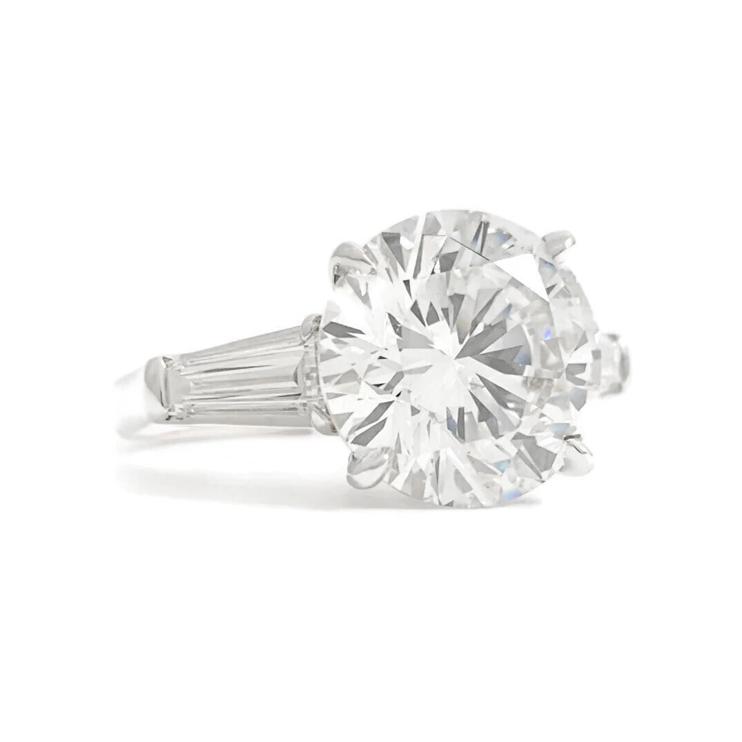 GIA Round Tapered Baguette Diamond Engagement Ring 18K White Gold, 5.91 CTW: GIA Round Tapered Baguette Diamond Engagement Ring 18K White Gold, 5.91 CTW This is a gorgeous diamond engagement ring! Please let us know if you have any questions! Diamonds: 5.91 ctw; 1 round
