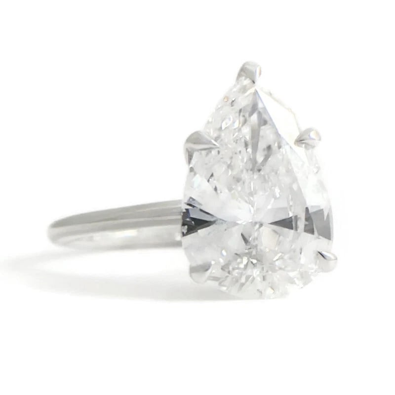 GIA Certified Pear Solitaire Diamond Engagement Ring 14K White Gold 3.08 CT: GIA Certified Pear Solitaire Diamond Engagement Ring 14K White Gold 3.08 CT This is a gorgeous diamond engagement ring! Please let us know if you have any questions! Diamonds: 1 pear shape, 3.08 ct, E