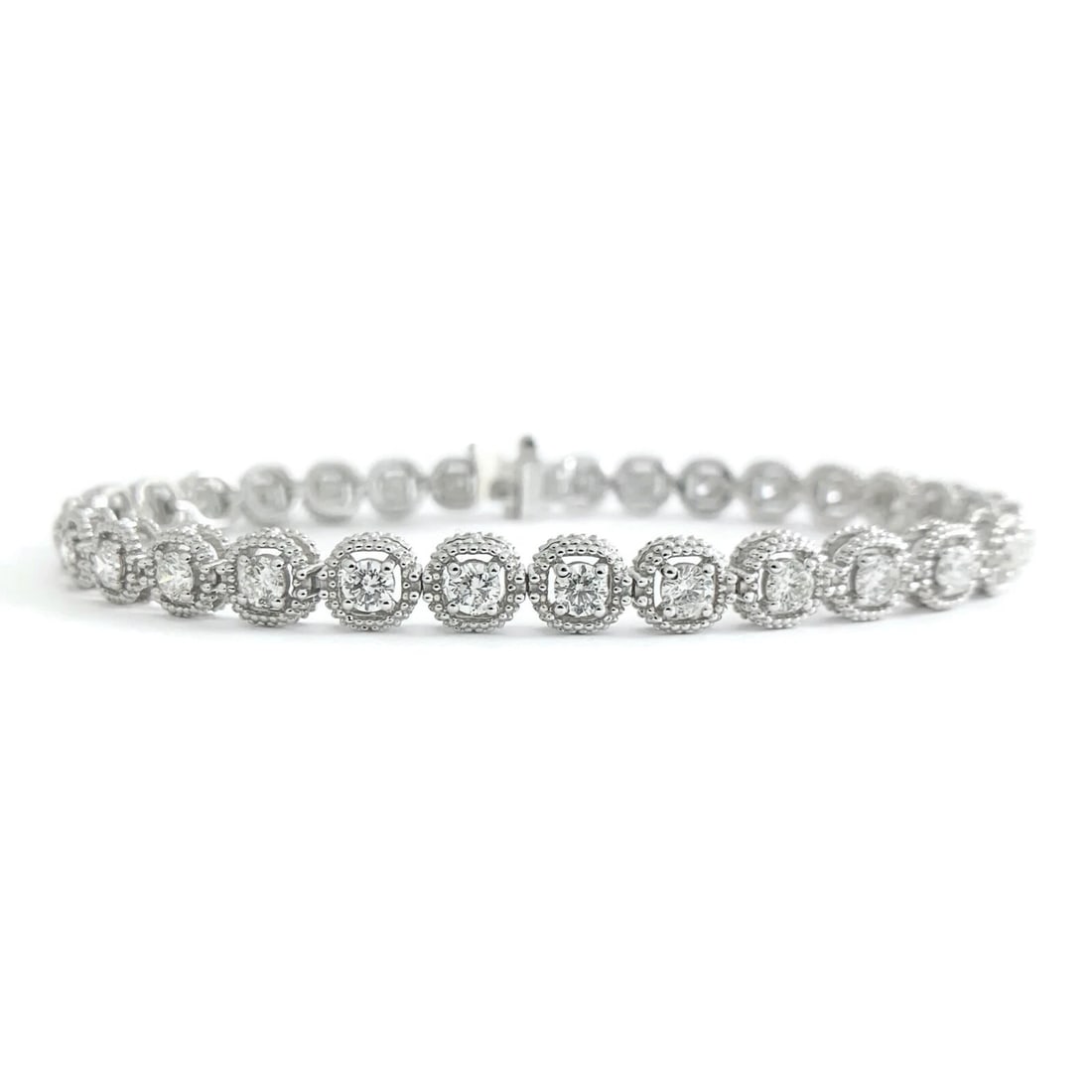 Milgrain Halo Round Diamond Tennis Bracelet 14K White Gold, 3.06 CTW, 11.52 Gr: Milgrain Halo Round Diamond Tennis Bracelet 14K White Gold, 3.06 CTW, 11.52 Gr This is such a gorgeous tennis bracelet! Please let us know if you have any questions. Diamonds: 30 round brilliant