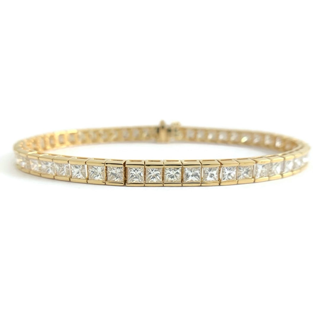 Princess Diamond Tennis Bracelet 14K Yellow Gold, 9.17 CTW, 7 Inches 15.00 Grams: Princess Diamond Tennis Bracelet 14K Yellow Gold, 9.17 CTW, 7 Inches 15.00 Grams This is such a gorgeous tennis bracelet! Please let us know if you have any questions. Diamonds: 52 princess cuts,