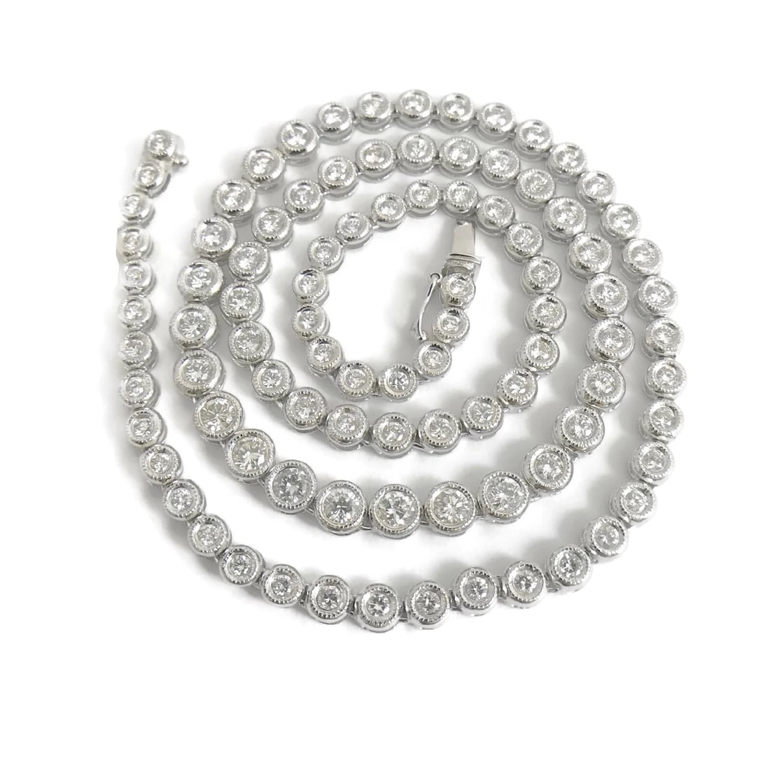 Diamond Milgrain Bezel Set Tennis Necklace 18K White Gold, 16 Inches, 4.33 CTW: Diamond Milgrain Bezel Set Tennis Necklace 18K White Gold, 16 Inches, 4.33 CTW Make a statement with this gorgeous diamond necklace. Let us know if you have any questions. Diamonds: 94 round