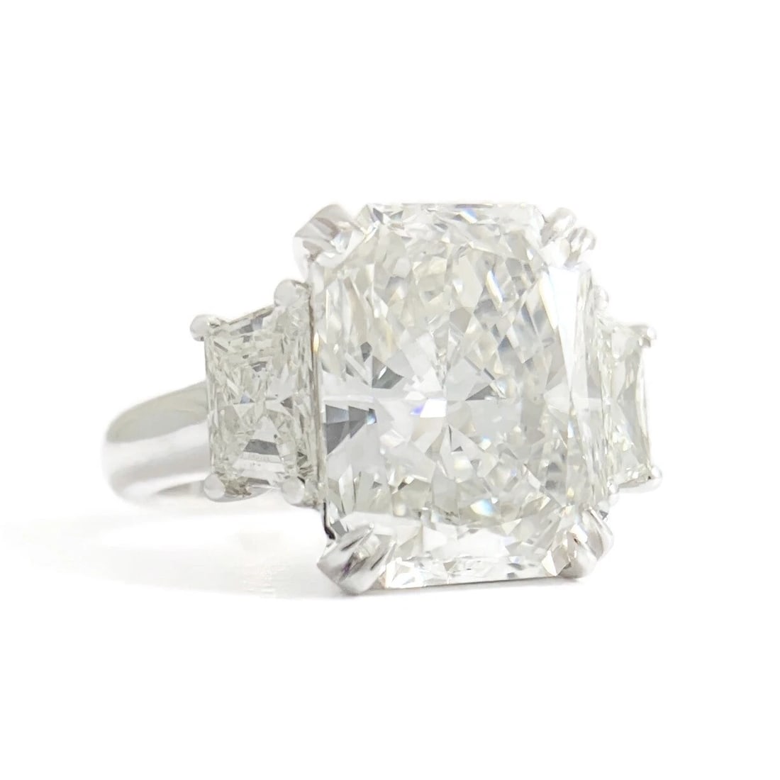 GIA 3-Stone Radiant Diamond Platinum Engagement Ring 4.89 CTW, 7.60 Grams: GIA 3-Stone Radiant Diamond Platinum Engagement Ring 4.89 CTW, 7.60 Grams This ring is gorgeous! A sparkly engagement ring she will love forever! Please let us know if you have any questions.